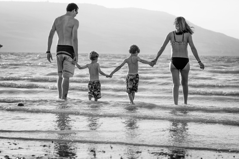 family-walking-in-sea